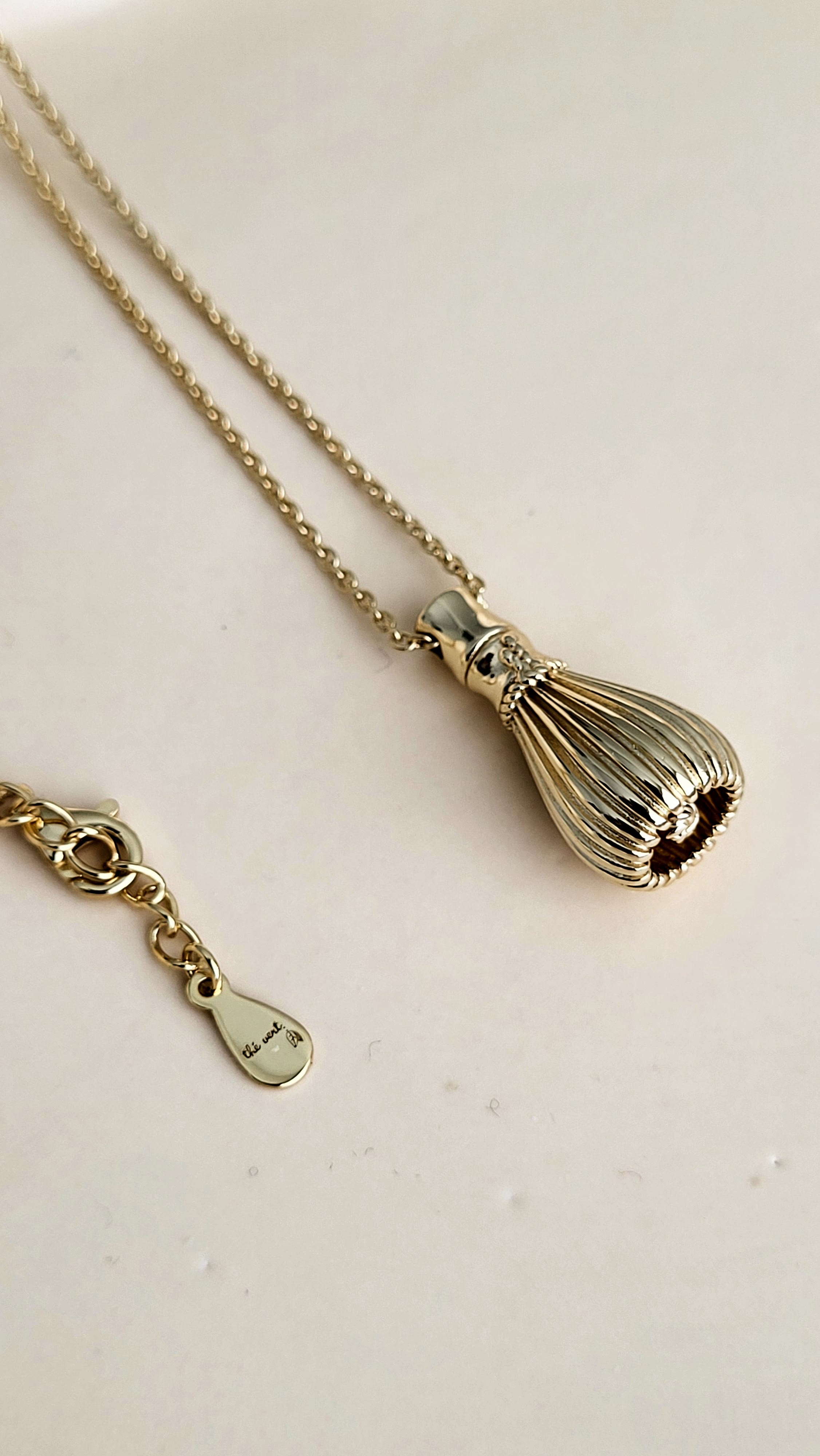 The Sana Matcha Whisk Necklace in Gold